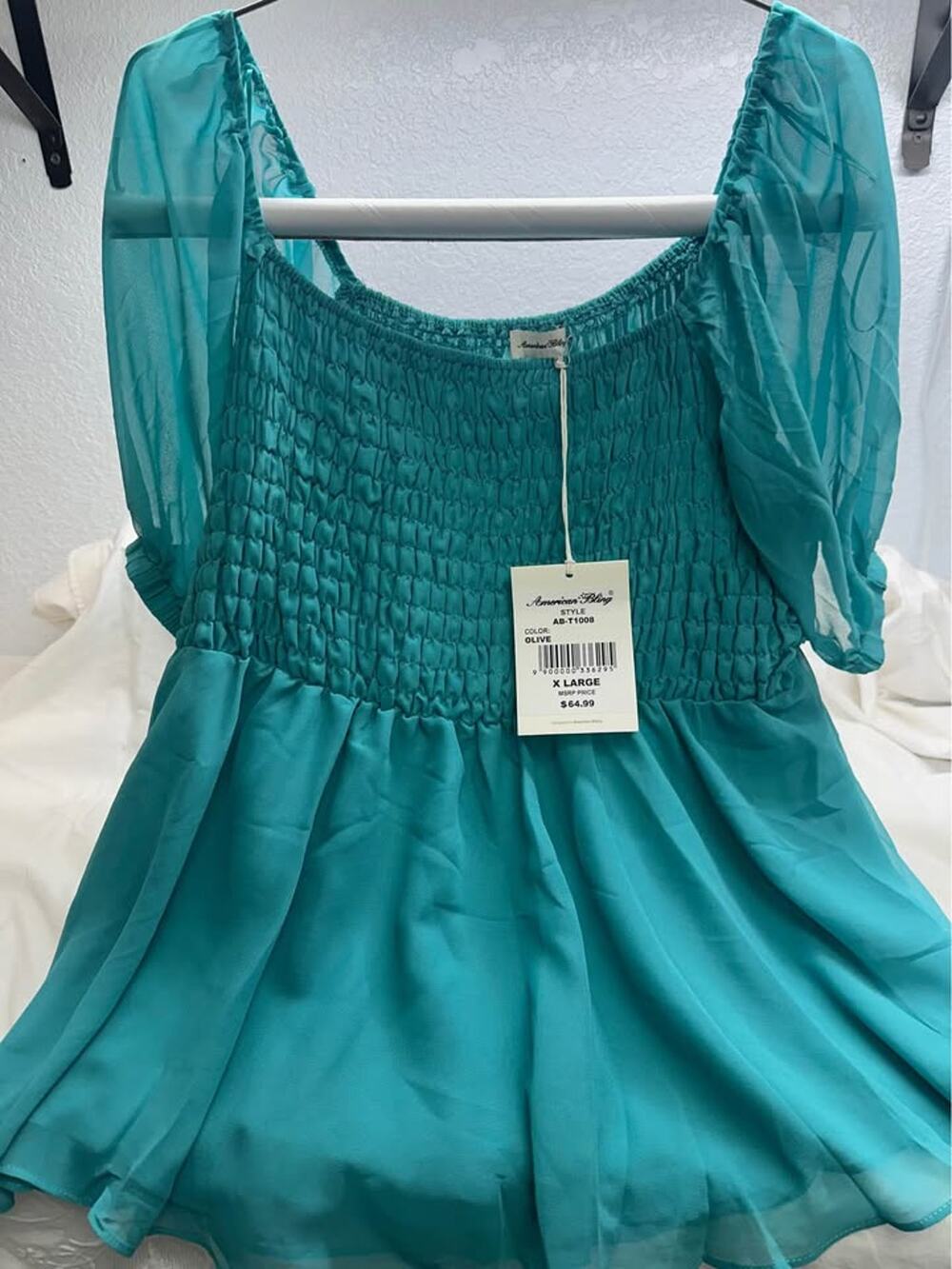 New American Bling Teal Smocked Blouse X Large. New w/tags boutique sizes B-339